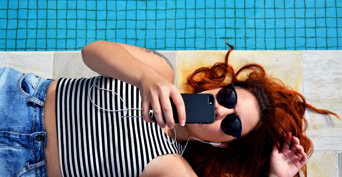 Poletje in pametni telefon (foto: Unsplash)