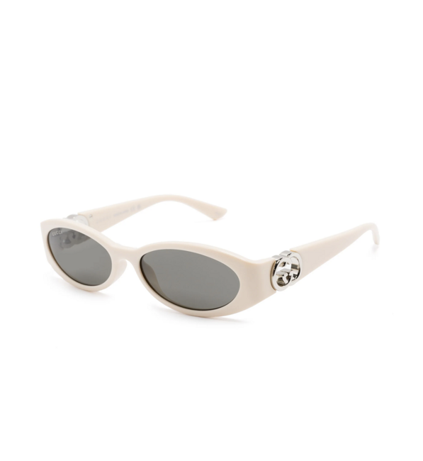 Ovalna sončna očala Gucci (Farfetch).